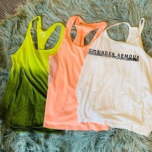 Lot of workout tanks. Under Armour, Nike and Reebok